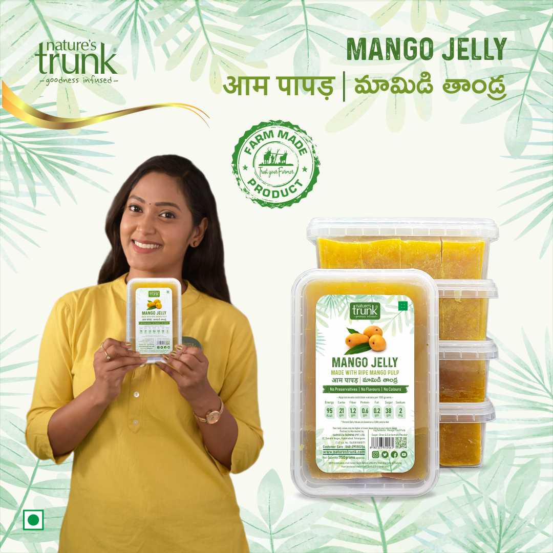 Open jar of Nature’s Trunk Mango Jelly showing thick pulp and preservative-free quality