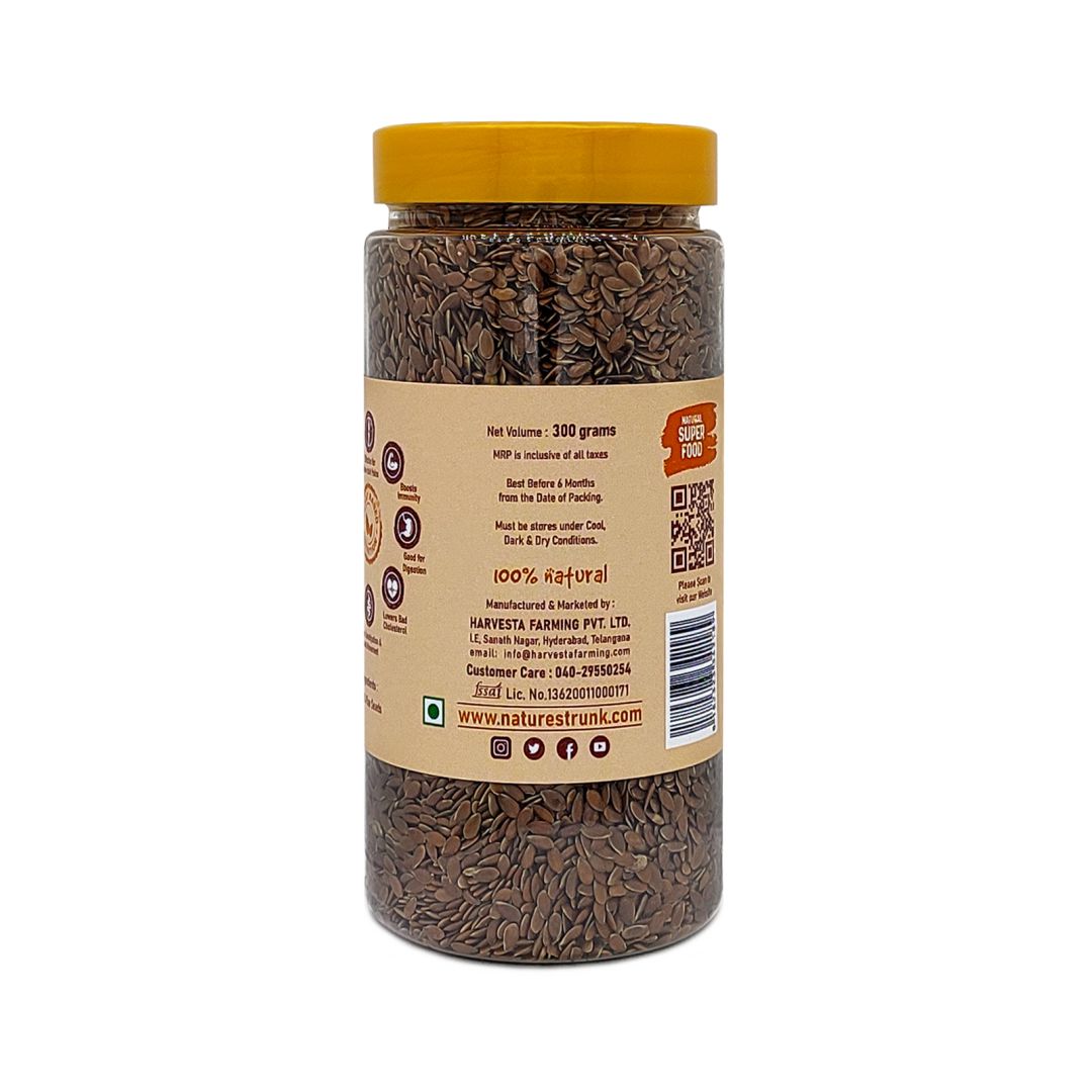 Back view of Nature’s Trunk flax seeds jar with label details, 100% natural healthy product, edible seeds online