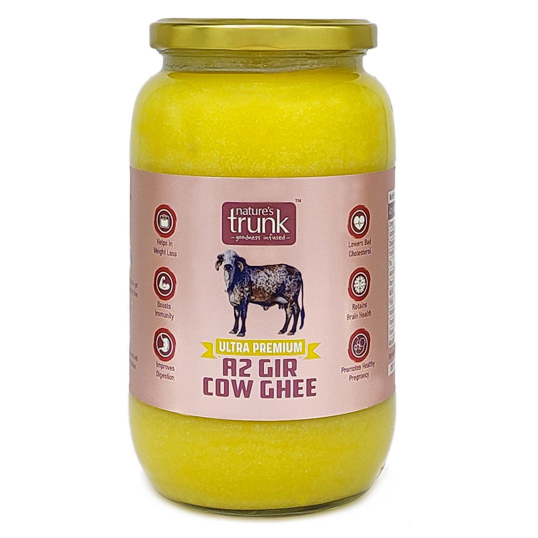 Bottle of organic cow ghee with rich golden texture, pure quality and nutrition for buying cow ghee online