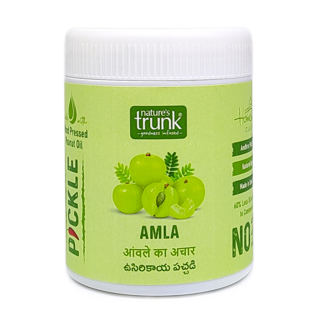 Nature’s Trunk amla pickle jar made with Indian gooseberry and spices, traditional Andhra usirikaya pickle